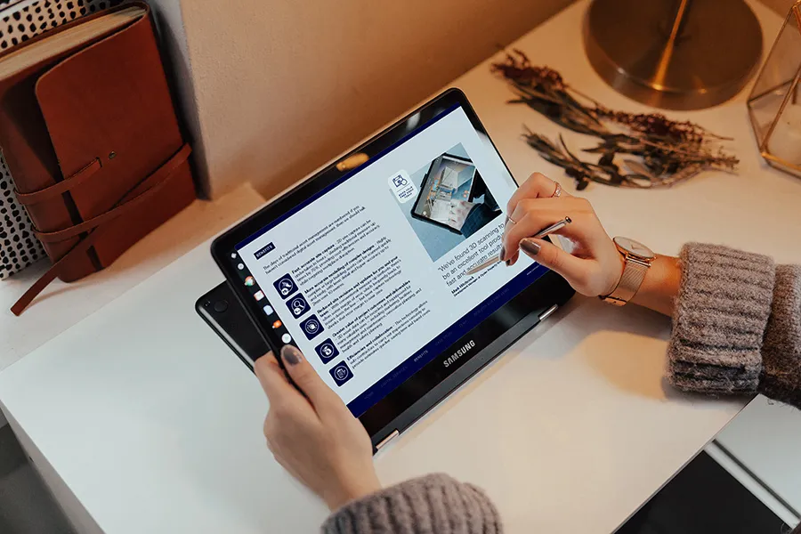 Page from the interactive PDF brochure — embedded media and project highlights.
